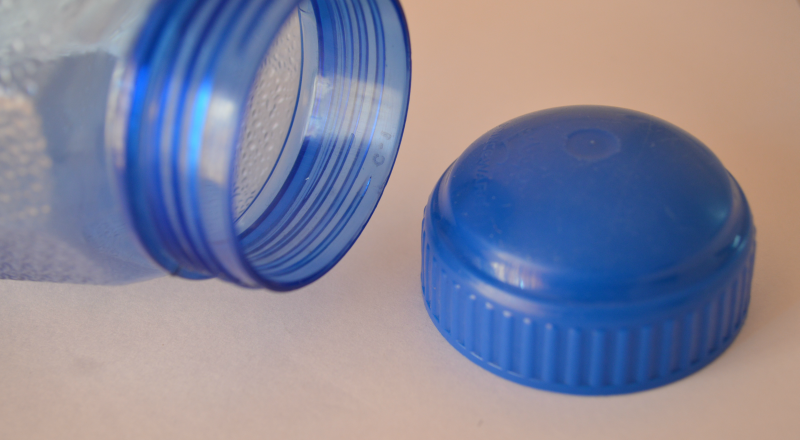 Blue Plastic bottle (top view) and cap